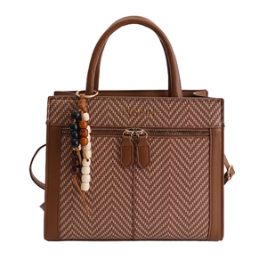 Brown textured leather crossbody bag with herringbone fabric and colorful wooden bead charm