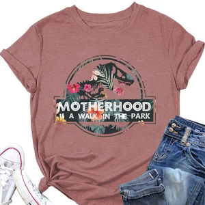 T-shirt rosa in cotone con logo a forma di dinosauro floreale e scritta sulla maternità