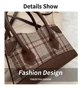 Détail du sac seau à carreaux en tweed avec finitions en cuir et coutures précises