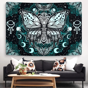 Bohemian black wall tapestry with butterfly mandala and gothic skull patterns in home interior
