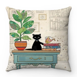 Detail of soft plush cushion cover featuring a hand-drawn cartoon black cat illustration