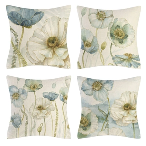 Set mit vier Leinen-Kissenbezügen mit eleganten blauen Mohnblumenmustern im Detail