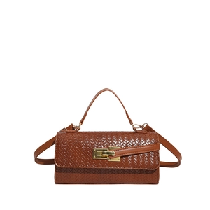 Brown woven leather crossbody bag with gold metal clasp and adjustable shoulder strap