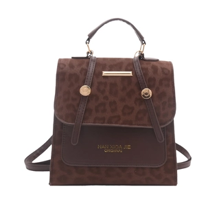 Leopard print faux suede tote bag with gold handle and adjustable shoulder straps