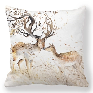 Detail view of watercolor deer print on a soft peach skin decorative cushion cover