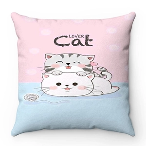 Detail of soft plush cushion cover featuring two cartoon cats and invisible zipper