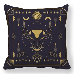 Detail of Taurus zodiac throw pillow case featuring gold celestial patterns on purple fabric