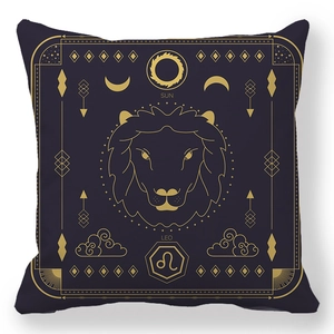 Detail of Leo zodiac cushion cover featuring golden lion embroidery on navy fabric