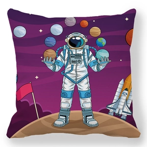 Detail of soft peach skin cushion cover with colorful cartoon astronaut and space pattern