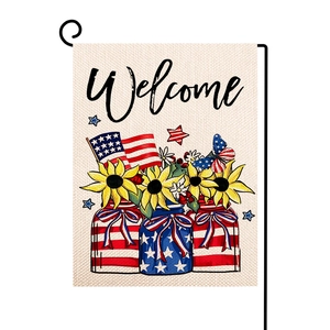 Detail of burlap garden flag with Welcome text, American jars, and bright sunflowers