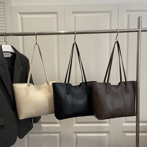 Minimalist large-capacity tote bag with wrinkled texture in beige, black, and coffee