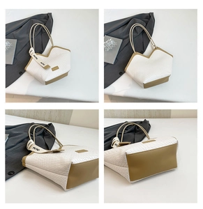 Dettaglio borsa tote in pelle intrecciata con finiture a contrasto e manico in seta