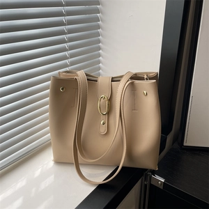 Vintage beige PU leather tote bag with gold buckle and long shoulder straps for women