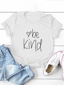Detail of white Be Kind cotton t-shirt with heart print and stylish front hem knot
