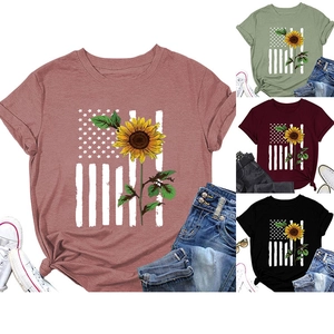 Detail view of sunflower American flag prints on short sleeve crew neck t-shirts
