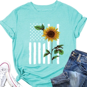Detail of light blue t-shirt with sunflower and American flag print plus cuffed sleeves