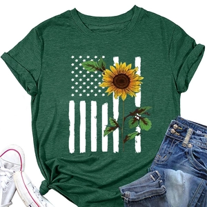Detail of sunflower American flag print on green t-shirt with stylish knot hem