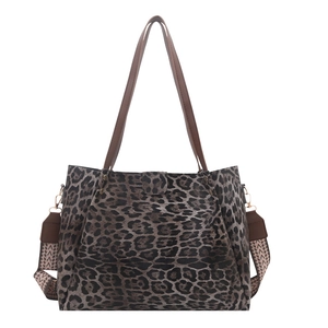 Large leopard print tote bag with brown handles and geometric patterned crossbody strap