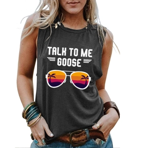 Close-up of Talk To Me Goose graphic print with retro aviator sunglasses and sunset