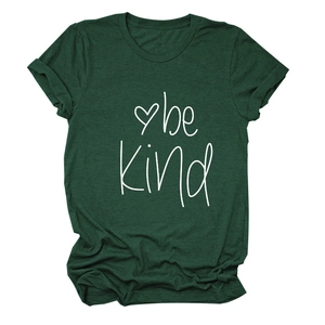 Close-up of the Be Kind letter print and soft cotton fabric on dark green T-shirt