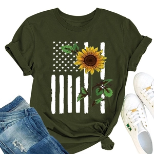 Sunflower American flag print t-shirt styled with white sneakers and blue denim jeans