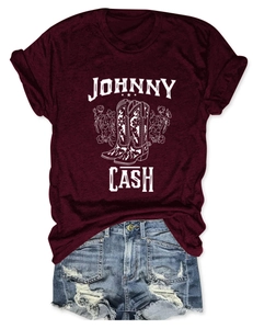 Close-up of Johnny Cash floral boot print on burgundy cotton blend t-shirt fabric