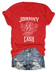 Detailed view of Johnny Cash vintage red t-shirt with floral boots print and denim shorts
