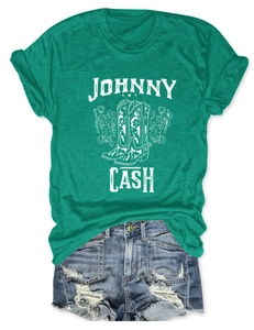 Detail of emerald Johnny Cash floral tee and distressed denim shorts summer set
