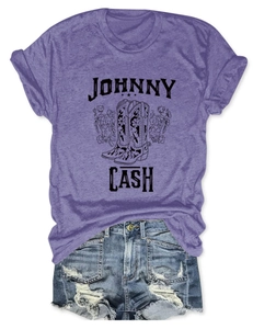 Detail of Johnny Cash graphic T-shirt featuring floral boots and vintage purple cotton fabric