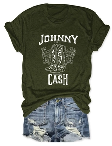 Flat lay of Johnny Cash graphic t-shirt with floral boots design and ripped denim shorts