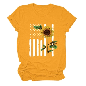 Detail of sunflower print on mustard yellow cotton t-shirt with American flag graphics