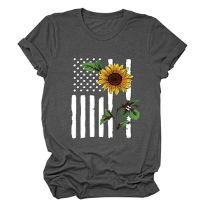 Detailed view of sunflower and American flag print on a charcoal grey t-shirt fabric