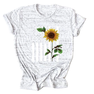 Detailed view of women's heathered white t-shirt featuring a large sunflower graphic print