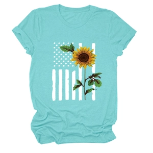Detail of sunflower and American flag print on a mint green short sleeve t-shirt