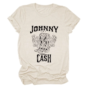 Detailed view of Johnny Cash vintage graphic print with cowboy boots on a beige t-shirt