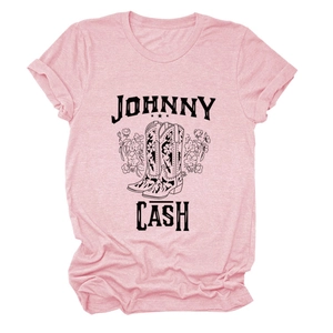 Close-up of Johnny Cash vintage floral boot print on pink cotton blend t-shirt