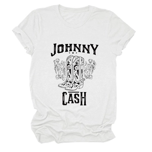 Close-up of Johnny Cash graphics with floral cowboy boots on a white cotton T-shirt
