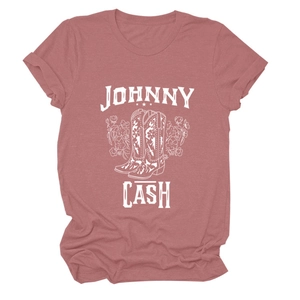 Detail of Johnny Cash graphic print on rose pink cotton t-shirt with floral boots