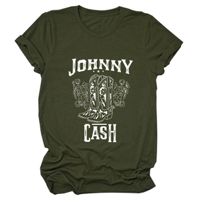 Close-up of Johnny Cash graphic on olive t-shirt with floral boots and vintage text