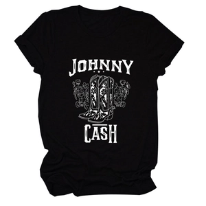 Close-up of Johnny Cash graphics with cowboy boots and flowers on a black cotton T-shirt