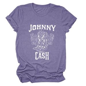 Detail of Johnny Cash graphic on purple t-shirt showing floral boots and star print