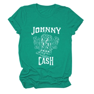Detail of Johnny Cash graphic print with floral cowboy boots on a green t-shirt