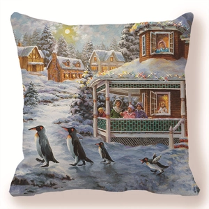 Detail of penguin winter landscape print on soft peach skin fabric sofa cushion cover