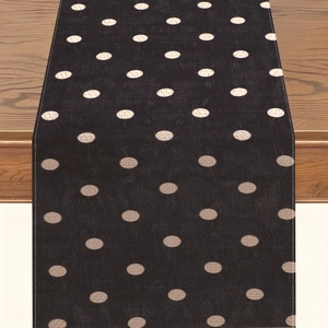 Runner da tavola in lino a grandi pois beige su fondo nero su legno scuro decorativo