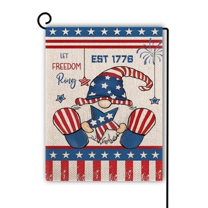 Detail of Independence Day garden flag featuring a gnome and linen fabric texture