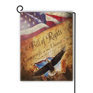 Detail of vintage linen garden flag with bald eagle, US flag and Bill of Rights design