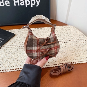 Borsa a mano invernale a quadri con fiocchi in pelle e manico in pizzo bianco