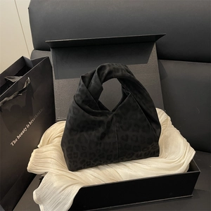 Chic black leopard print tote bag with unique twisted handle and gift box set