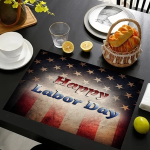 Close-up of Happy Labor Day linen placemat with American flag design and table setting