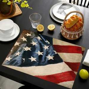 Macro detail of rustic linen placemat featuring retro American flag design on wooden table
